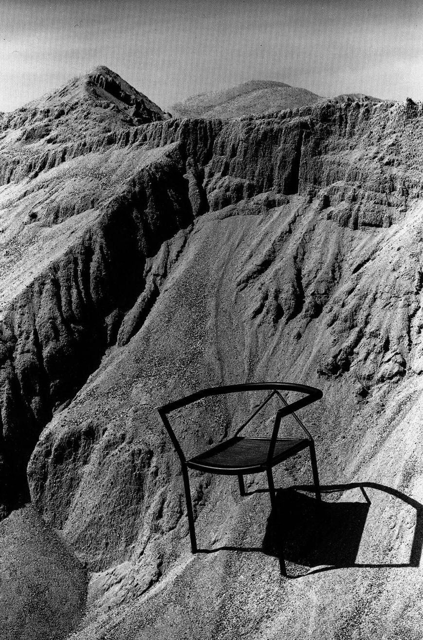 poltroncina chair submerged in sand